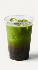 a transparent plastic cup filled with dirty matcha latte, layered vibrant green matcha and dark espresso, slightly uneven blending between layers