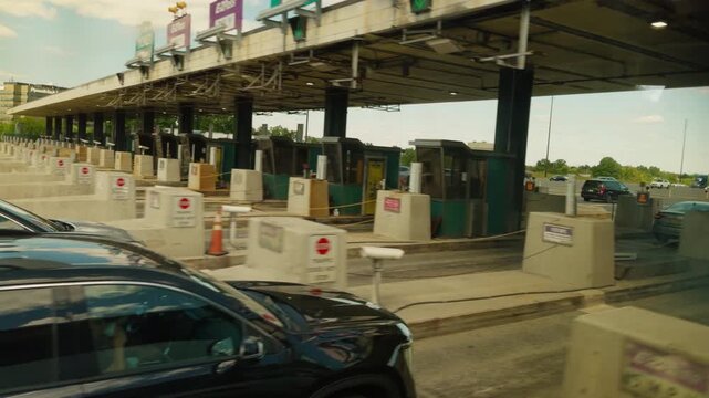 Driving Scenics in New Jersey Cars Approaching Toll Plaza on the Highway