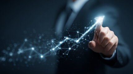 A man in a suit is pointing to a graph that shows a rising line