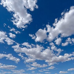 The sky is blue with many clouds scattered throughout