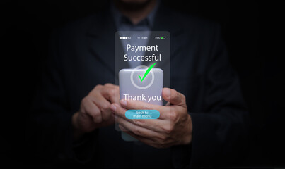 Businessman holding smartphone showing successful online payment confirmation. Concept of secure digital transaction, fintech, mobile banking, e-commerce, and cashless economy.