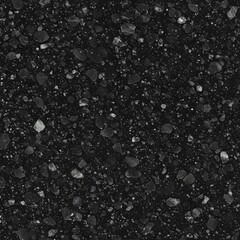 Fototapeta premium A close up view of a dark black granite surface with small white and gray flecks throughout the stone