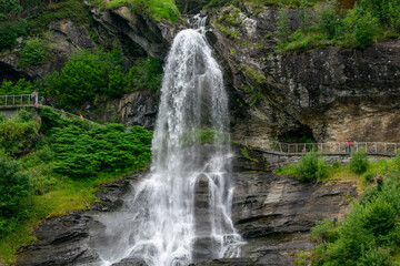 Obraz premium Steindalsfossen Waterfall with Walkway in Kvam, Vestland, Norway
