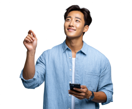 A man is holding a cell phone and smiling