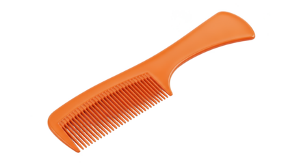 Tangerine plastic comb isolated against black