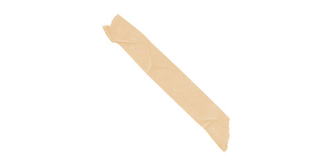 Isolated strip of beige masking tape torn and wrinkled laying diagonally against a stark black