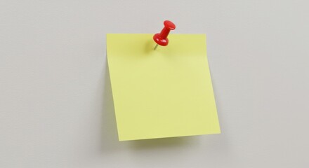 A blank yellow sticky note pinned to a light grey surface.