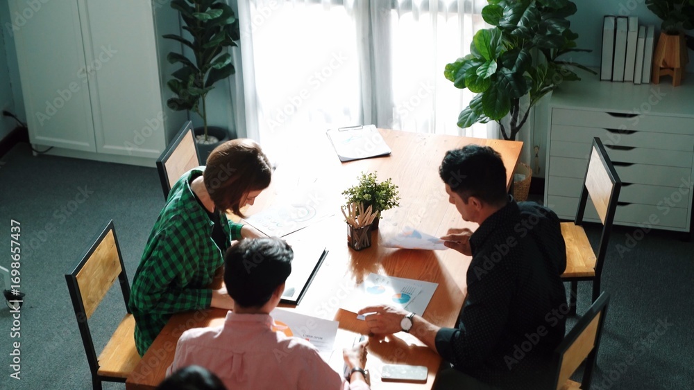 Poster top view of diverse business team explain marketing idea to investor while manager hold laptop and g