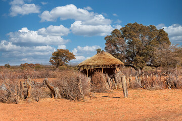 village african house with thatched roof traditional , cattle post, Krall, pen , shack , mud house with thatched roof, bush homestead, tribal community