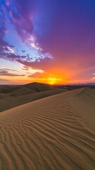 Desert sunset, vibrant colors, sand dunes