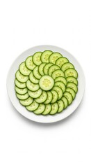 Overhead view of a white plate filled with fresh cucumber slices arranged in a circular pattern, isolated on a clean white background creating a refreshing and healthy culinary image