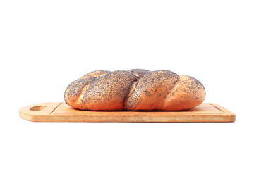  Bun with poppy seeds on a kitchen board