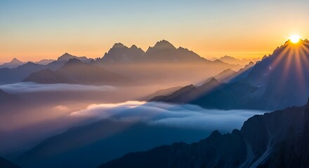 Majestic Sunrise Over Misty Mountain Peaks