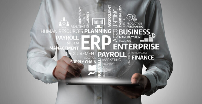 A business professional uses a tablet to visualize critical ERP system concepts, highlighting finance management, payroll operations, and enterprise solutions for organizational efficiency. Tessel