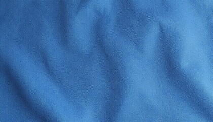 Blue fabric texture with soft folds and creases  