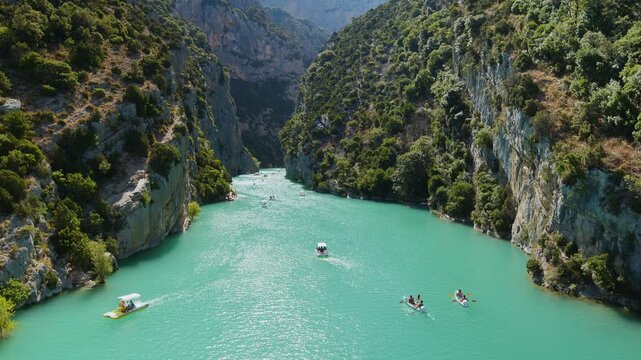 Boating and kayaking on the Verdon Gorge, the lake Sainte Croix du Verdon in Southern France.