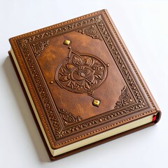 Fototapeta premium Ornate leather bound book with central floral medallion design, exquisite detailing on white background