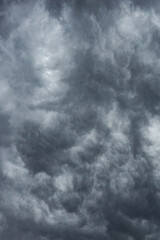 the sky is covered with black clouds. stormy sky. stormy sky background. bad weather.  