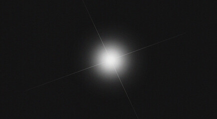 Distant elliptical galaxy glowing brightly in the vast darkness of deep space