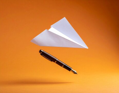Fountain Pen and Paper Levitating on an Orange Background

