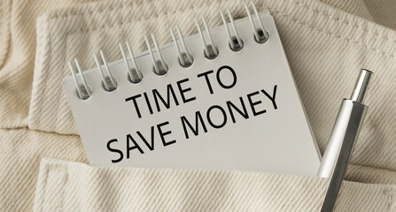 A pocket notebook with a pen and the word Time to Save Money written on it
