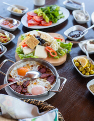 Turkish breakfast set on a wooden table