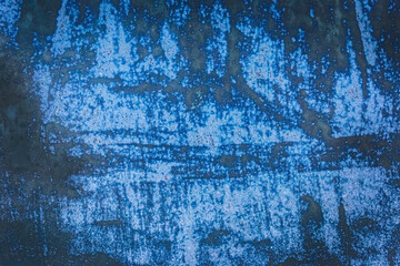 Old blue dirty concrete wall texture with abstract grunge pattern background