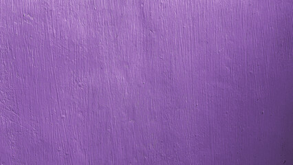 Close up of purple painted wall surface showing textured details. Simple background suitable for construction material, design backdrop, or minimal abstract pattern.