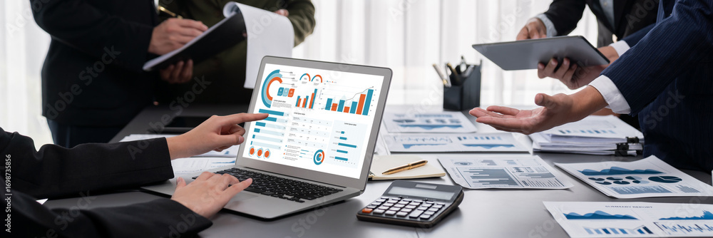 Poster panorama shot analyst team utilizing bi fintech to analyze financial report with laptop. businesspeo