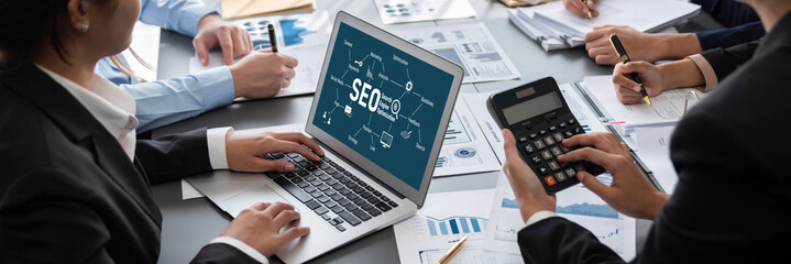 Business intelligence and data analysis concept. Analyst team working on financial data analysis...