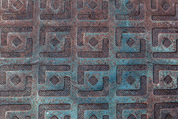 A metal sheet covered with a convex pattern. Metal background, metal texture.