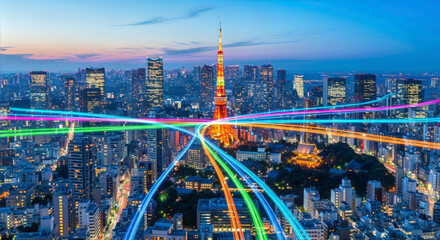 Tokyo cityscape at dusk with tokyo tower illuminated and light trails streaking across the urban landscape