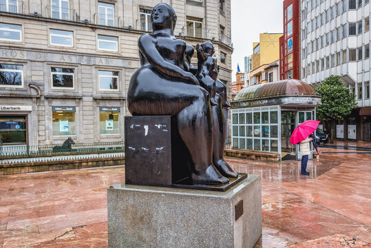 Oviedo, Spain - January 24, 2019: Motherhood - statue created by Fernando Botero Angul on Escandalera Square in Oviedo city