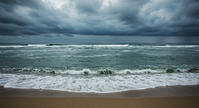 Dramatic storm clouds gather over powerful ocean waves crashing onto a serene sandy beach - Powered by Adobe