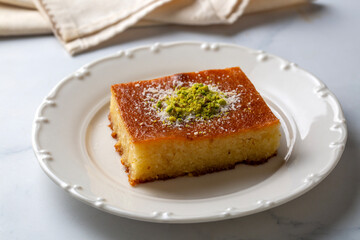 Revani - sweet semolina cake with pistachio, traditional turkish dessert