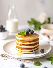 Stacked pancakes with blueberries