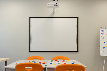 Vibrant learning space with colorful chairs and interactive tools to engage students