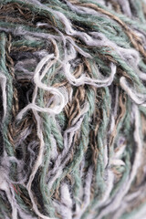 Close up of ball of woolen thread as a background texture.