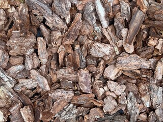 Close up of natural brown tree bark mulch texture