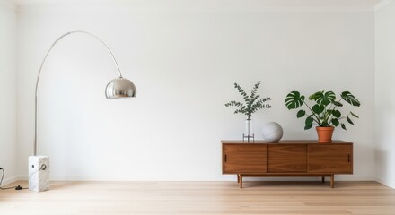 Minimalist living room with arc floor lamp and wooden sideboard