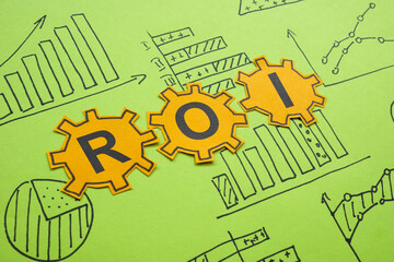 ROI Return on Investment abbreviation and charts. Financial performance.