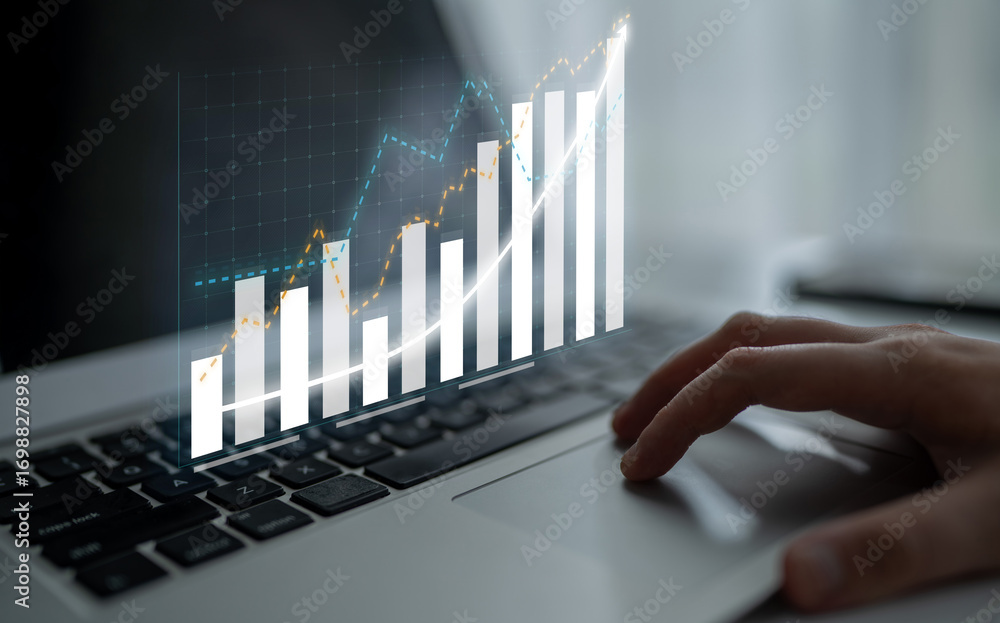 Poster a modern laptop with financial graphs displayed on the screen, representing business analytics and d