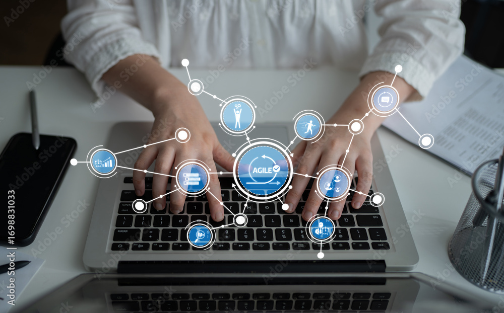 Poster close-up of hands typing on a laptop with various icons symbolizing agile methodology, showcasing th
