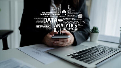 A modern office scene showcasing data analytics concepts with a person using a smartphone, emphasizing the importance of technology in today business landscape. Tessel