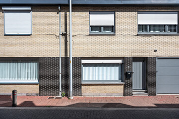 Modest houses in a row in Moerbeke, East Flanders, Belgium