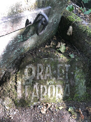 Old stone tablet with the inscription 'Ora et Labora' in the garden of the retreat house in 54655 St. Thomas, Germany on August 31, 2022