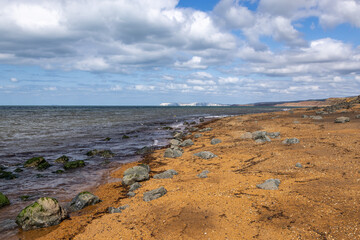 Looking along a deserted rugged beach on the Isle of Wight, at Whale Chine