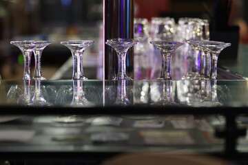 inverted glasses on the bar counter