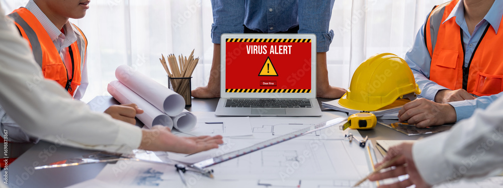 Poster virus warning alert on computer screen detected brisk cyber threat , hacker, computer virus and malw