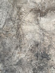 Marble stone texture with grey and white natural veins. Close-up of marble stone surface with detailed grey and white natural veins. Luxury mineral background for architecture, interior decoration